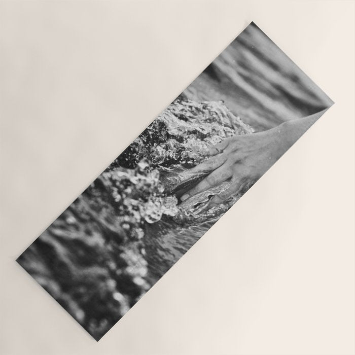 Running hand through the water, under the blue again black and white photograph / art photography Yoga Mat Gallery Image 1