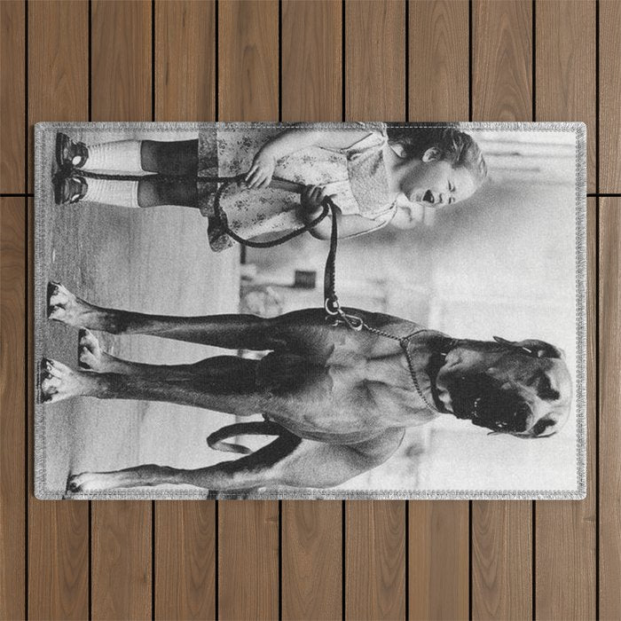 The Happiness of Little Girls and Great Danes black and white photograph Outdoor Rug Gallery Image 1