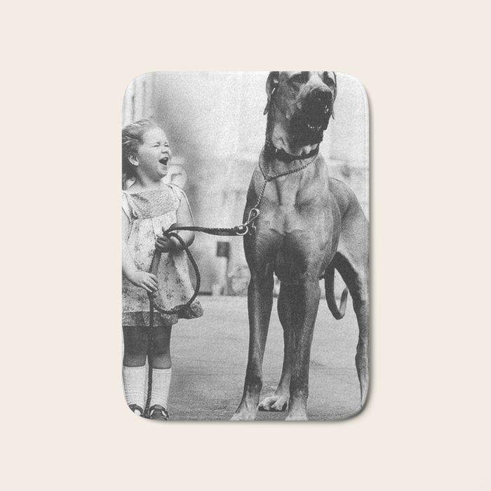 The Happiness of Little Girls and Great Danes black and white photograph Bath Mat Gallery Image 1