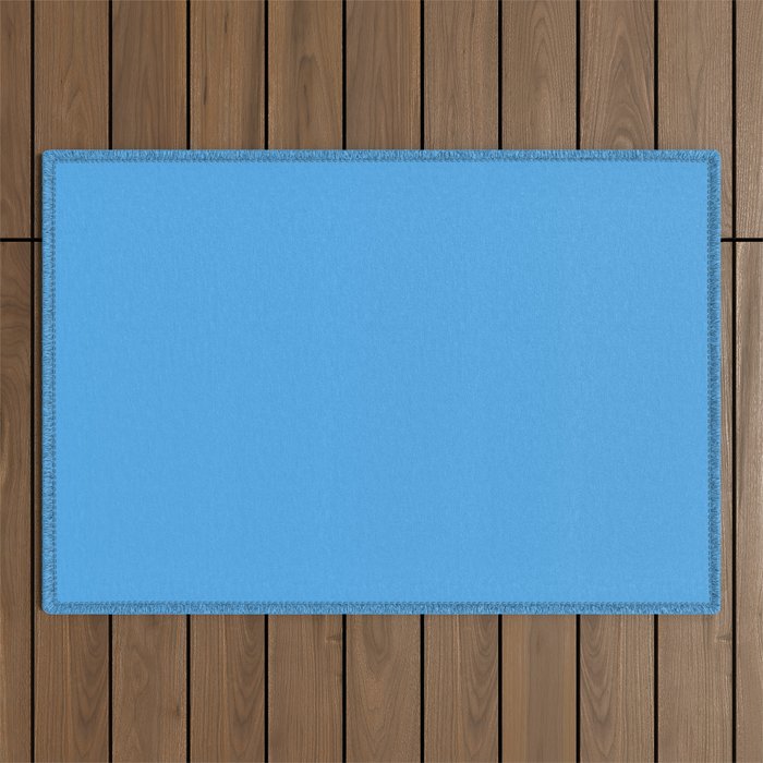 Blue Joy Solid Color Outdoor Rug Gallery Image 1