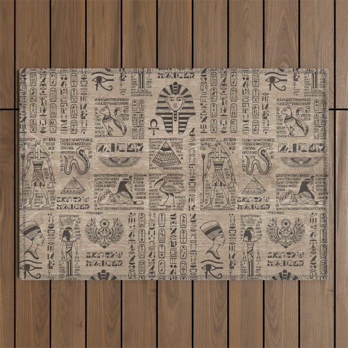 Egyptian hieroglyphs and symbols on wood Outdoor Rug Gallery Image 1