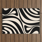 New Groove Retro Swirl Abstract in Black and Almond Cream Outdoor Rug Gallery Image 1