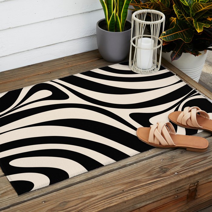 New Groove Retro Swirl Abstract in Black and Almond Cream Outdoor Rug Gallery Image 2