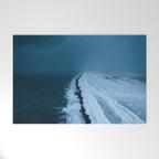Black Sand Beach with snow in Iceland during a storm â Moody Landscape Photography Welcome Mat Gallery Image 1