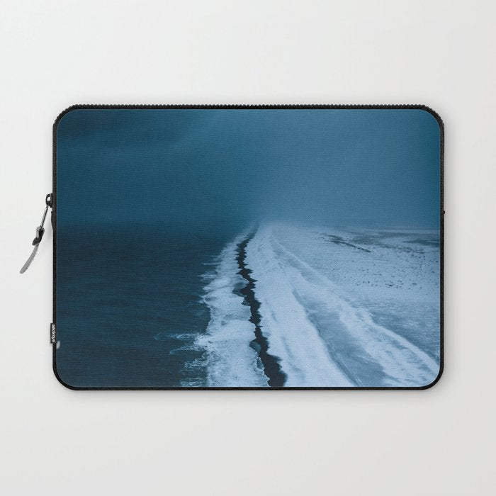 Black Sand Beach with snow in Iceland during a storm â Moody Landscape Photography Laptop Sleeve Gallery Image 1