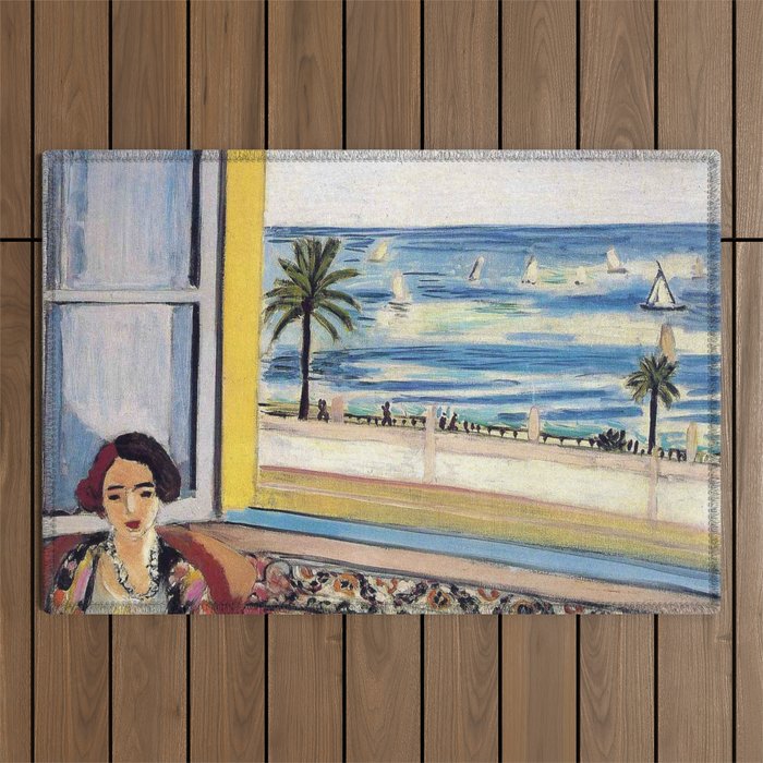 Seated Woman, Back Turned to the Open Window of Ocean & Seaside by Henri Matisse Outdoor Rug Gallery Image 1