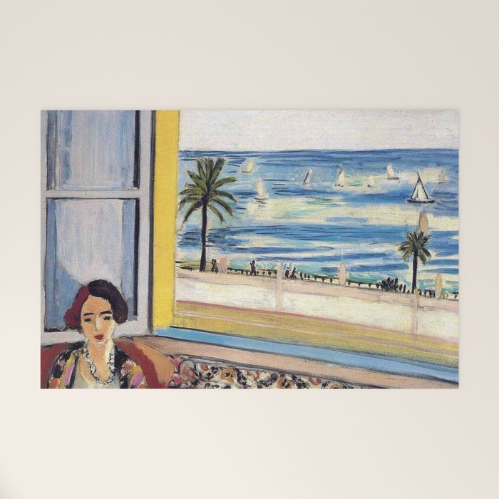 Seated Woman, Back Turned to the Open Window of Ocean & Seaside by Henri Matisse Welcome Mat Gallery Image 1