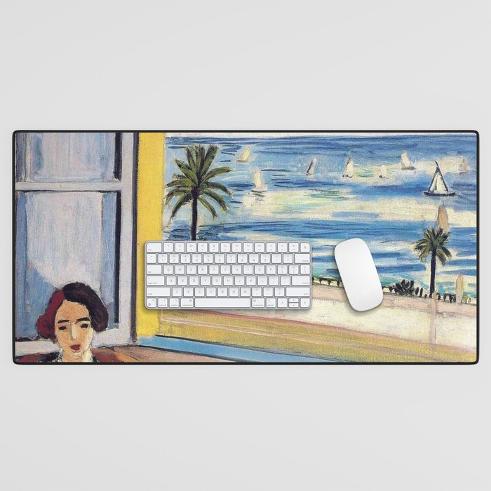 Seated Woman, Back Turned to the Open Window of Ocean & Seaside by Henri Matisse Desk Mat Gallery Image 1