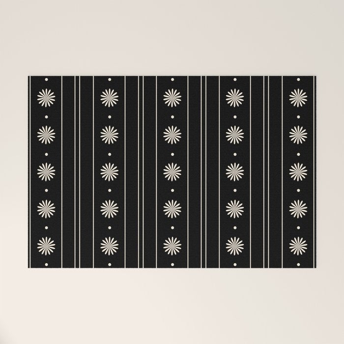 Minimalist Daisy Stripes Geometric Flowers and Stripe Pattern in Black and Almond Cream Welcome Mat Gallery Image 1