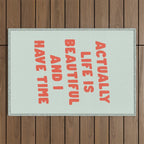 Actually Life is Beautiful and I Have Time typography print in pastel green and red Outdoor Rug Gallery Image 1