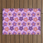 Groovy Flowers Print in Purple Outdoor Rug Gallery Image 1