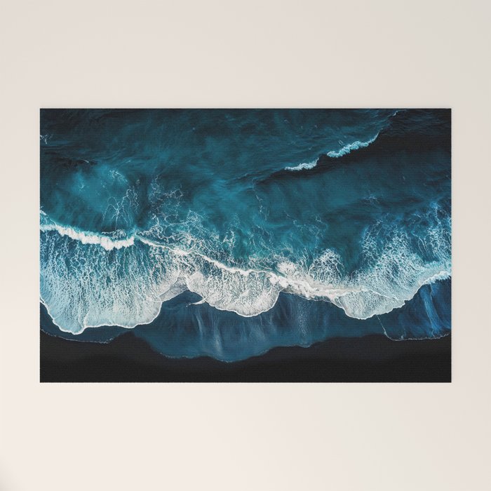 Wild Waves on a Black Beach in Iceland - Moody Aerial Photography Welcome Mat Gallery Image 1
