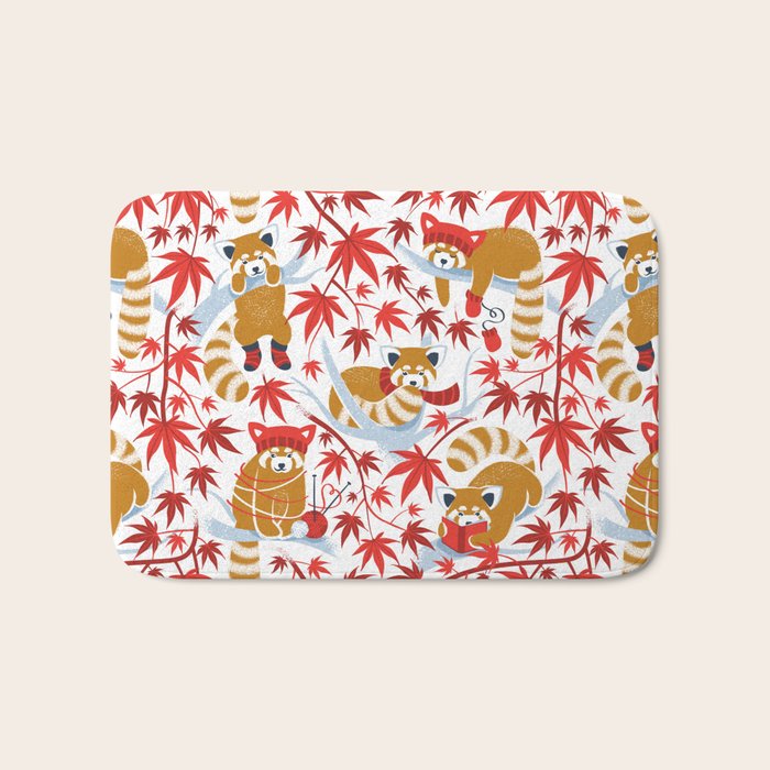 Red panda blending with the foliage // white background desert sun brown cozy animals fog blue tree branches red acer leaves Bath Mat Gallery Image 1