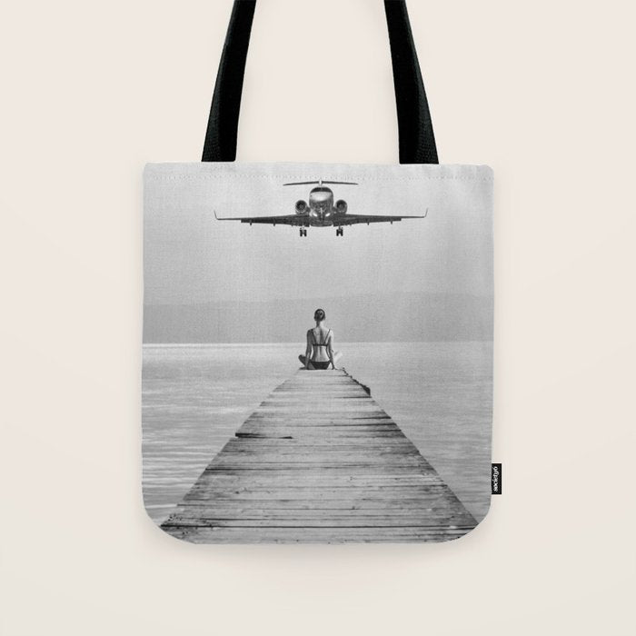 Steady As She Goes 6; aircraft coming in for an island landing female in bikini black and white photography - photographs - photograph Tote Bag Gallery Image 1