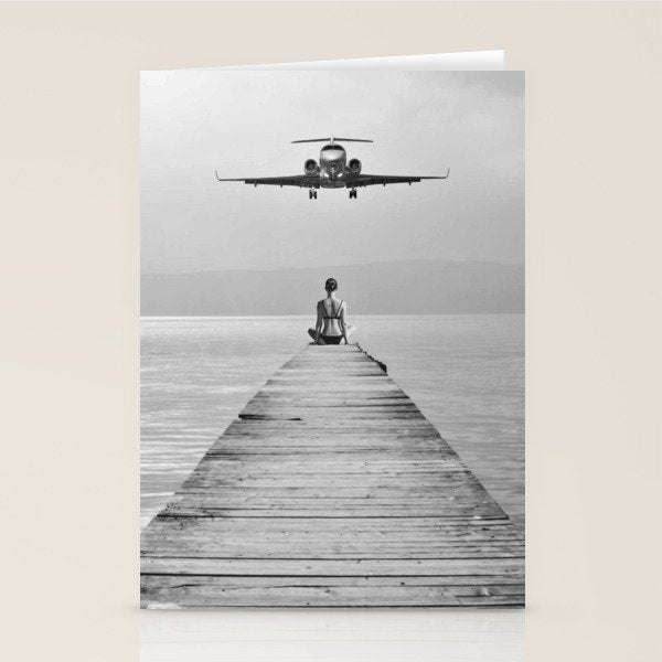 Steady As She Goes 6; aircraft coming in for an island landing female in bikini black and white photography - photographs - photograph Stationery Card Gallery Image 1