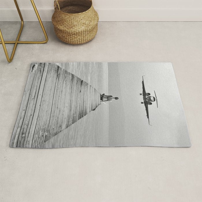 Steady As She Goes 6; aircraft coming in for an island landing female in bikini black and white photography - photographs - photograph Rug Gallery Image 1