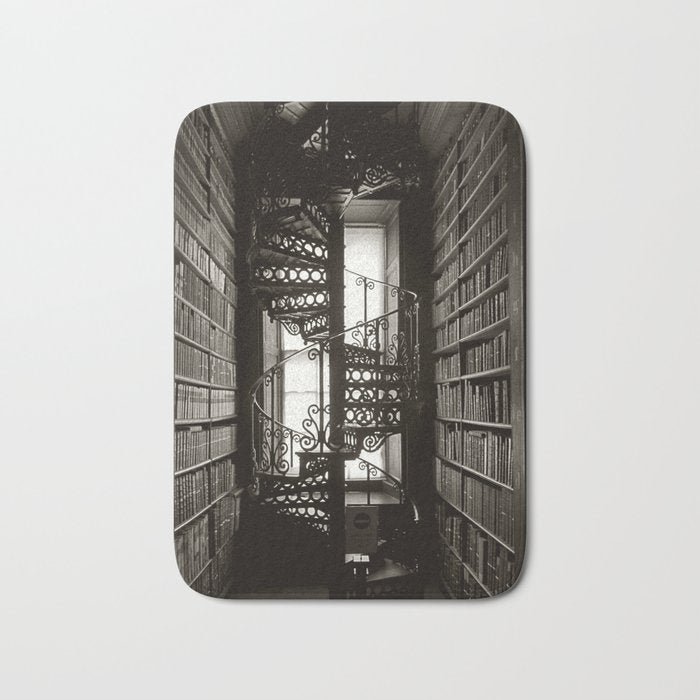 Trinity College, Dublin, Ireland, iron spiral stairs in Library College Long Room black and white photograph Bath Mat Gallery Image 1