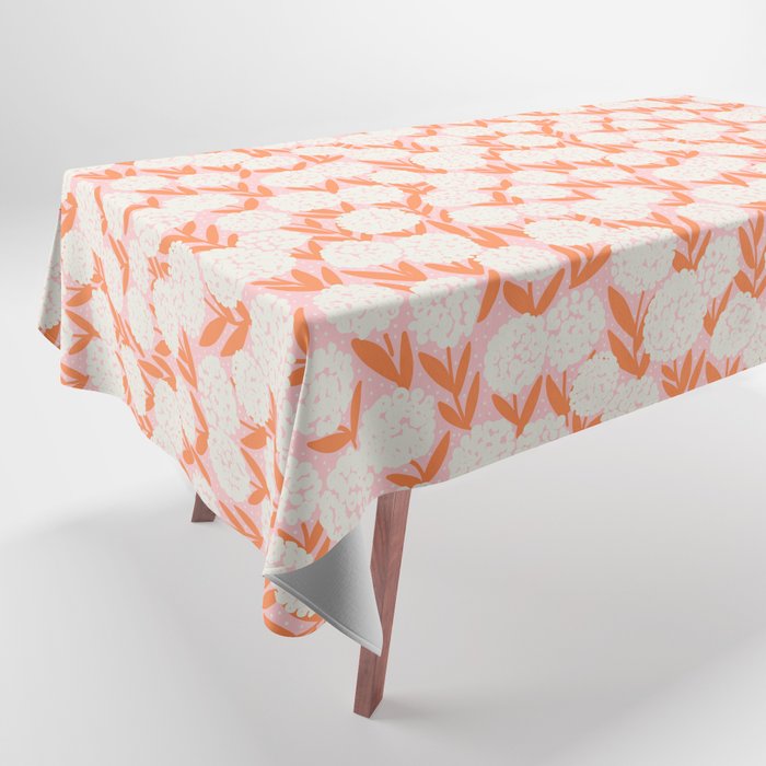 Blooming Abstract Cream and Orange Allium Flowers on Pastel Pink Tablecloth Gallery Image 1