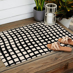 Warped Modern Minimalist Grid in Black and Almond Cream Outdoor Rug Gallery Image 2