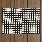 Warped Modern Minimalist Grid in Black and Almond Cream Outdoor Rug Gallery Image 1