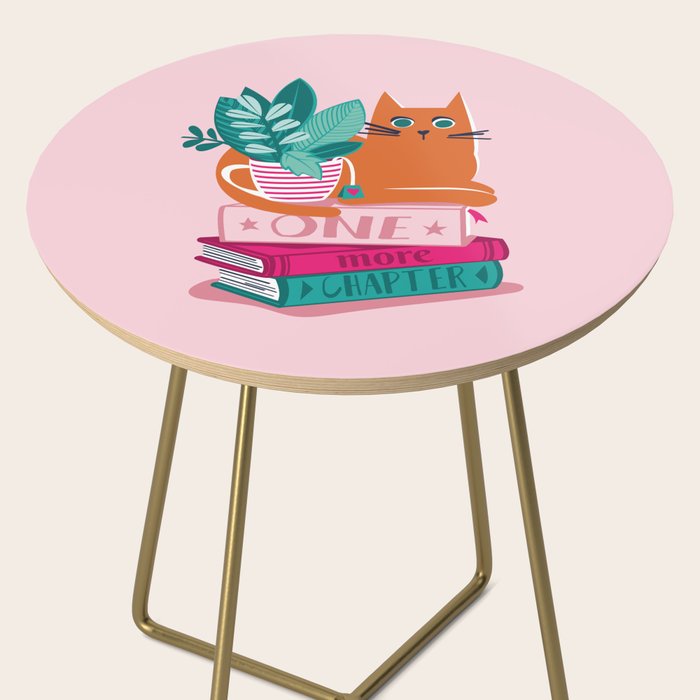 One more chapter // pastel pink background orange tabby cat striped mug with plants fuchsia pink and green books  Side Table Gallery Image 2