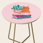 One more chapter // pastel pink background orange tabby cat striped mug with plants fuchsia pink and green books  Side Table Gallery Image 2