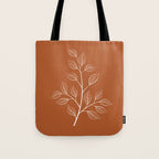 Delicate White Leaves and Branch on a Rust Orange Background Tote Bag Gallery Image 1