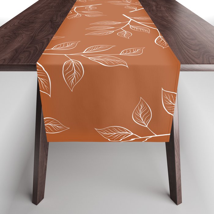 Delicate White Leaves and Branch on a Rust Orange Background Table Runner Gallery Image 1