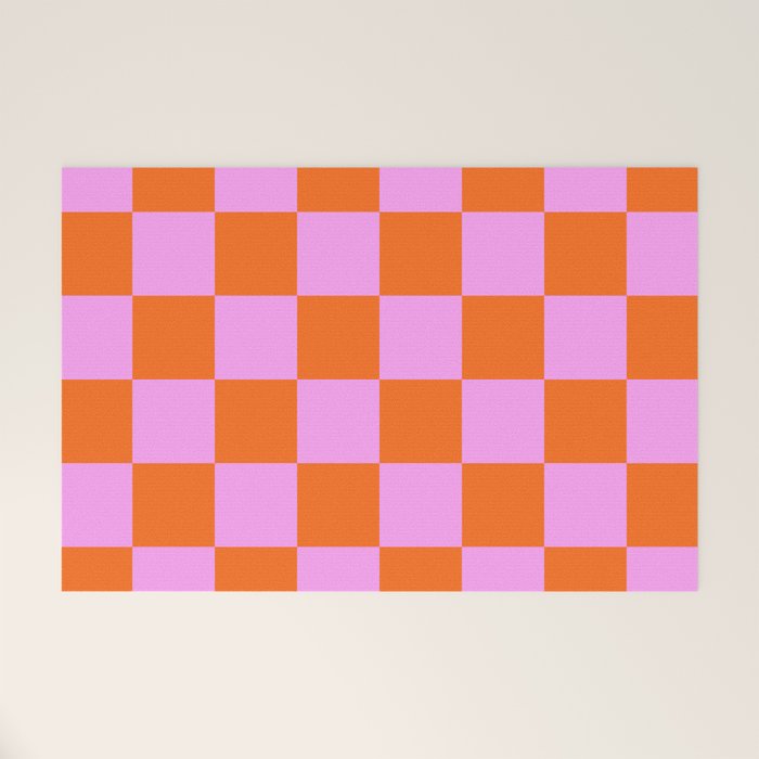 Checkerboard Retro Check Geometric Checked Pattern in Bright Orange and Pink Welcome Mat Gallery Image 1