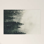 Thick pine forest in the descending mist Welcome Mat Gallery Image 1