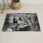 Grouchy Lion being kissed by brunette girl black and white photography Rug Gallery Image 1