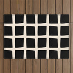 Midcentury Windows Geometric Check Pattern in Black and Almond Cream Outdoor Rug Gallery Image 1