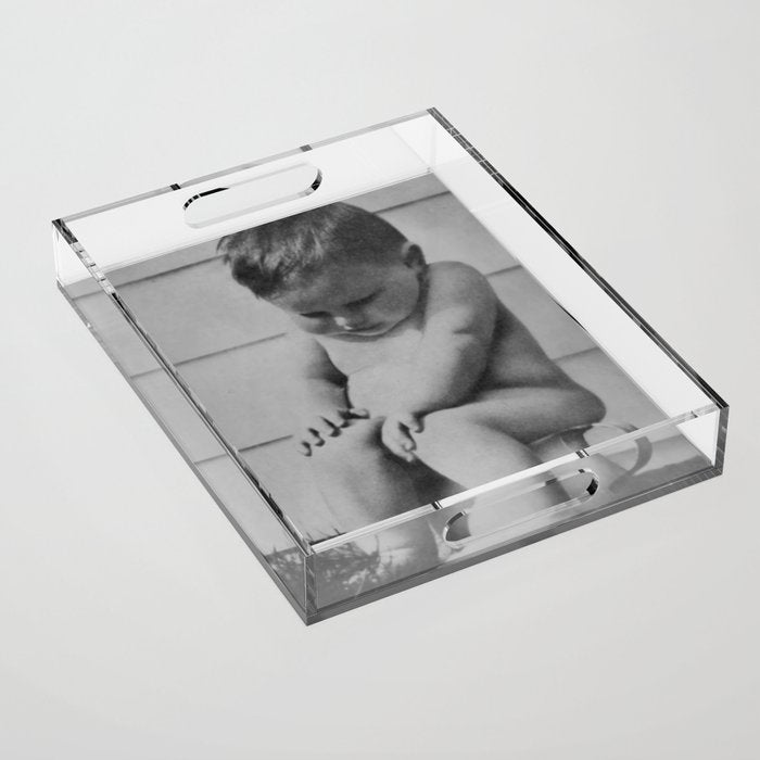 Giving all your effort - funny baby potty training on the pot black and white photograph  Acrylic Tray Gallery Image 1