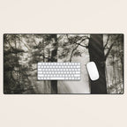 Pathway of light, sunlight and sunbeams in forest black and white photograph by J W Chapman Taylor Desk Mat Gallery Image 1