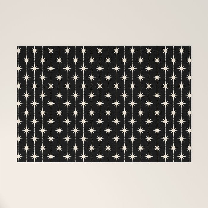 Mid Century Modern Atomic Stars and Dots Pattern in Black and Almond Cream Welcome Mat Gallery Image 1