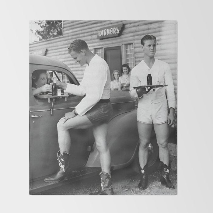 Texas love, male drive-in car hops in shorts and cowboy boots at drive in tavern near Love Field Airport in Dallas vintage black and white photograph - photography - photographs Throw Blanket Gallery Image 2