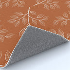 Delicate White Leaves and Branch on a Rust Orange Background Rug Gallery Image 4