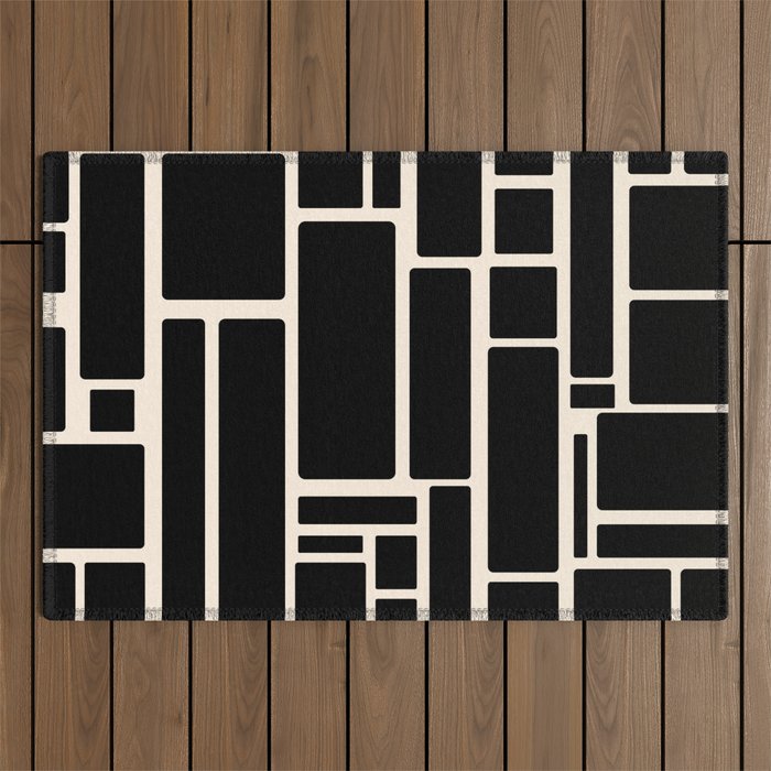 Modulus Minimalist Geometric Pattern in Black and Almond Cream Outdoor Rug Gallery Image 1