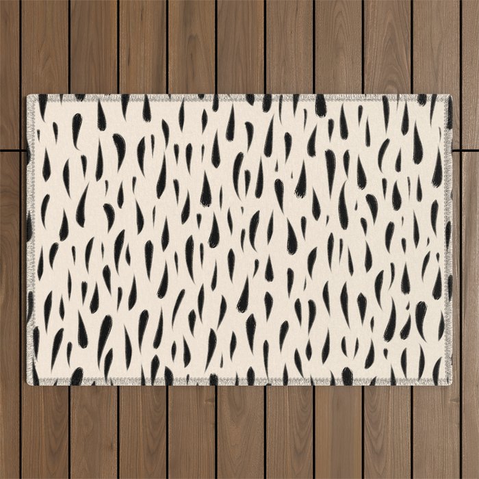 Organic Texture Minimalist Abstract Pattern in Black and Almond Cream Outdoor Rug Gallery Image 1