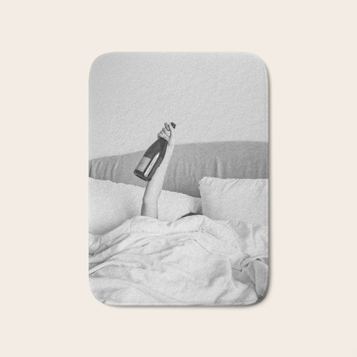 Champagne In Bed - Black And White Photography - Girl With Alcohol Bottle In Hand Photograph - Photo Bath Mat Gallery Image 1