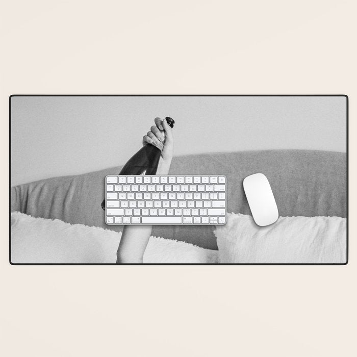 Champagne In Bed - Black And White Photography - Girl With Alcohol Bottle In Hand Photograph - Photo Desk Mat Gallery Image 1