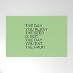 The day you plant the seed is not the day you eat the fruit Welcome Mat Gallery Image 1