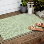 Mid Century Modern Minimalist Woven Line Pattern in Light Sage Green and Cream Outdoor Rug Gallery Image 2