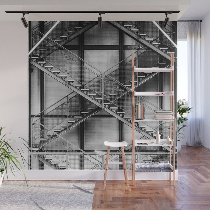 Escape from New York fire escape symmetrical steel staircase architecture black and white photograph Wall Mural Gallery Image 1