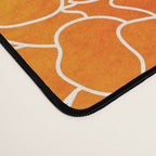 Puakenikeni lei art on white Desk Mat Gallery Image 4