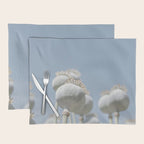 Nostalgic midtones poppy bulbs in a blue sky - retro style nature photography Placemat Gallery Image 1