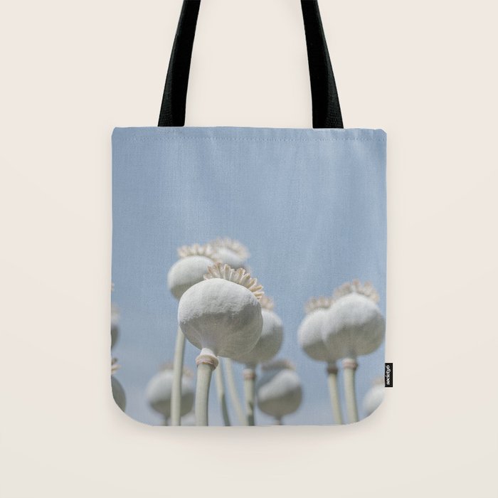 Nostalgic midtones poppy bulbs in a blue sky - retro style nature photography Tote Bag Gallery Image 1