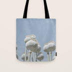Nostalgic midtones poppy bulbs in a blue sky - retro style nature photography Tote Bag Gallery Image 1