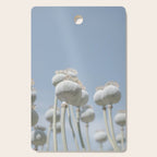 Nostalgic midtones poppy bulbs in a blue sky - retro style nature photography Cutting Board Gallery Image 1