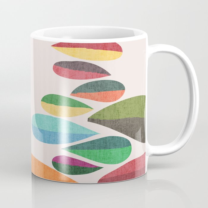 Bird nesting on top of pebbles hill Coffee Mug Gallery Image 1